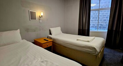 OYO Citi Hotel Aberdeen Room Type - Standard Quad Room