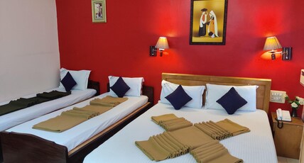 Hotel Athithi Room Type - Deluxe Four Bedded Non AC