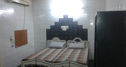 DWARAKALODGE Room Type - DOUBLE ROOM(A/C)