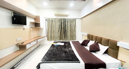 Shivalay INN Room Type - Deluxe Room with Air Conditioning
