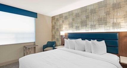 Best Western Plus City Centre Inn Room Type - Suite - 1 King 2 Queen Beds, Non-Smoking, Family Room, Wi-Fi, Refrigerator