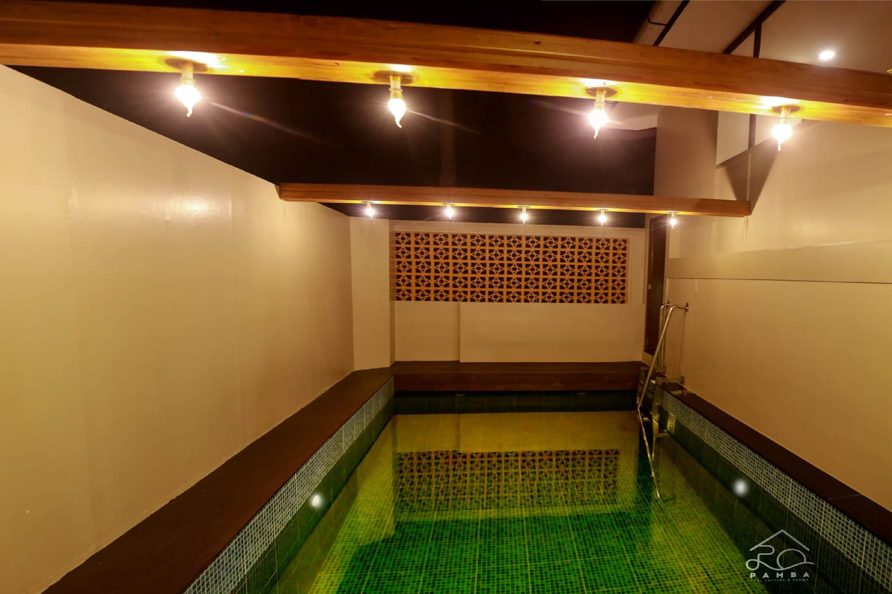 Pamba pool cottage & rooms - Tap to explore photos