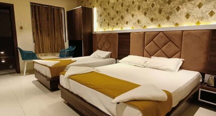 HOTEL TANISH LODGING AND BOARDING Room Type - Deluxe Room with City View