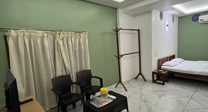 NAINAS RESIDENCY ALAPPUZHA Room Type - Bedroom 205