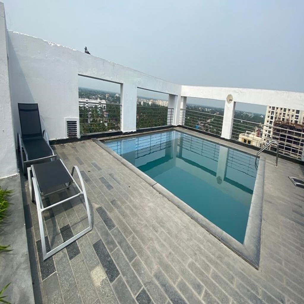 Cozy Studio Apartment with Pool at Siddha Xanadu 512 - Tap to explore photos
