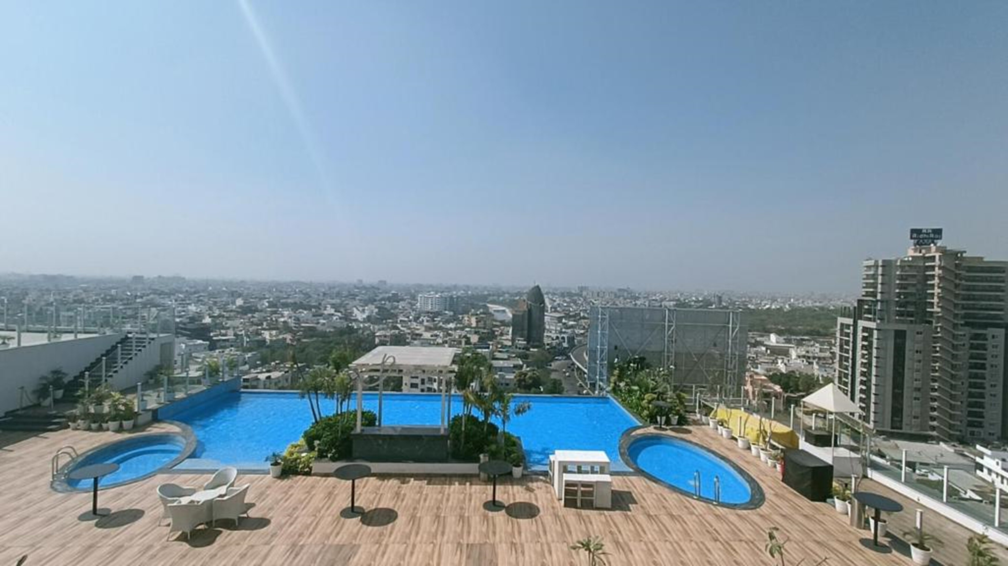 Studio 808 luxury suite with skyline view balcony - Tap to explore photos