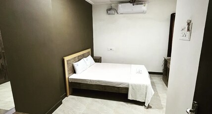 SAN BEACH RESIDENCY Room Type - Double Bedroom AC