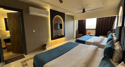 Hotel Gyan Room Type - Ganga Facing Four Bed Room (River View) Single Members not allowed Hotel Gyan Room Type - Ganga Facing Four Bed Room (River View) Single Members not allowed