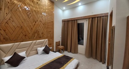 MONAL INN Room Type - Semi Wooden Finish Room (Mountain View)
