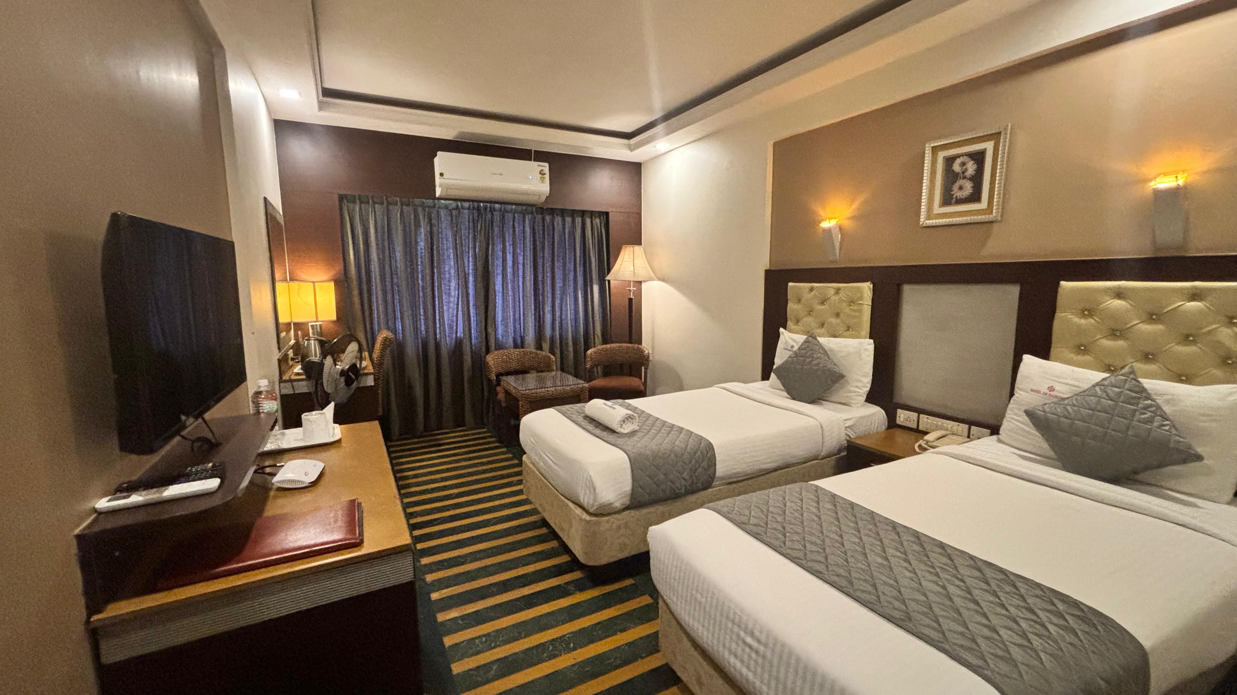 Dr. Rajkumar International Hotel - Tap to explore photos