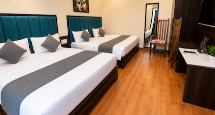 Hotel Modern Palace Room Type - Family Room (2 Double Bed | 4 Pax )in besement Hotel Modern Palace Room Type - Family Room (2 Double Bed | 4 Pax )in besement