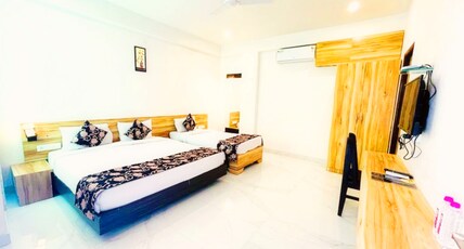 HOTEL THE CELEBRATION - BY AMOD Room Type - Family Triple Bed Room