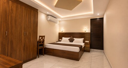 Grey Inn Stays Room Type - AC DELUXE ROOM