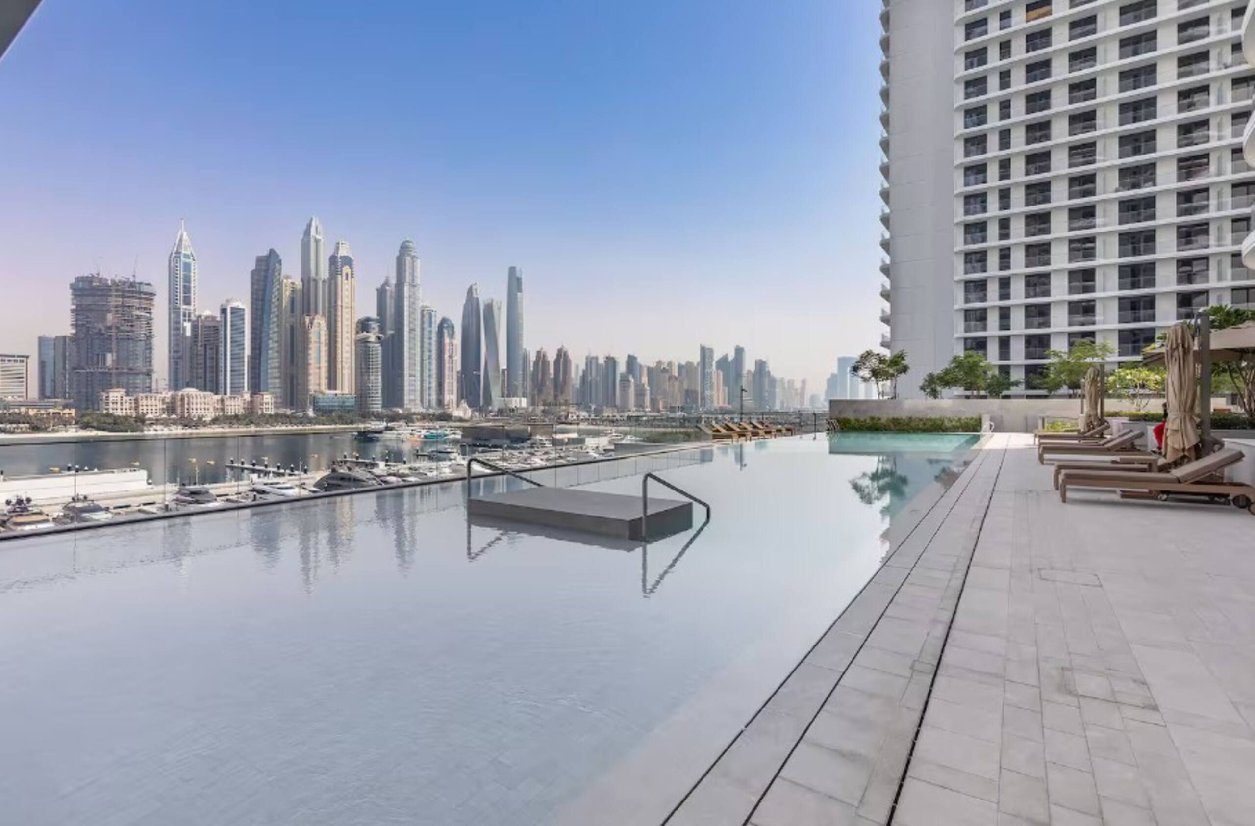 Luxury 1BR Private Beach Access Emaar Beachfront - Tap to explore photos