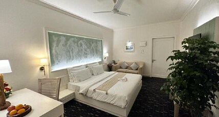 WaveCrest Morjim By Joy Stays Room Type - Deluxe Room