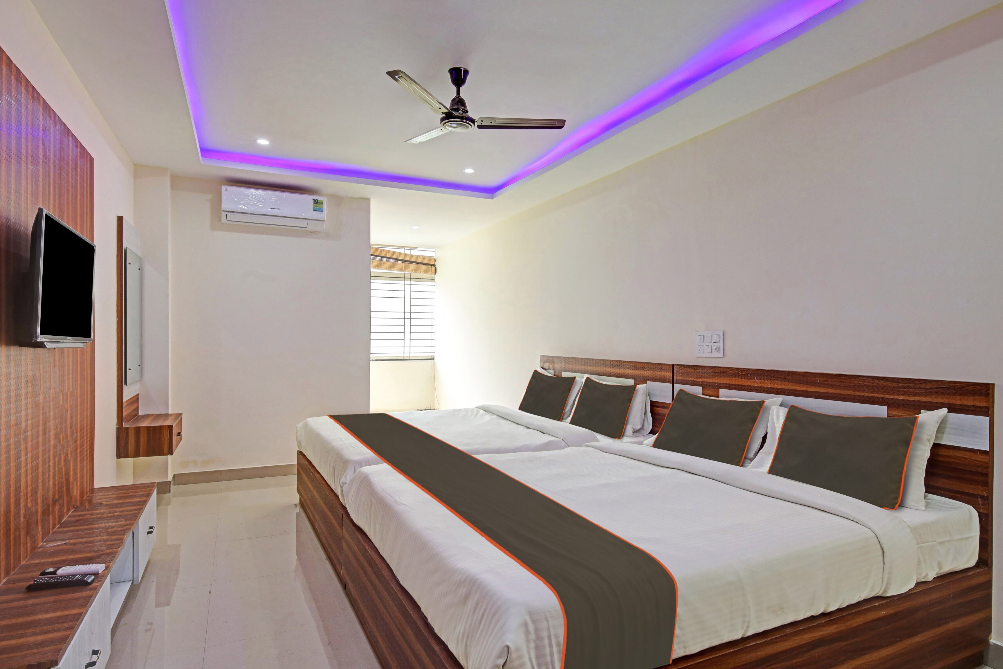 Collection O Daivik Sunset Suites - Tap to explore photos