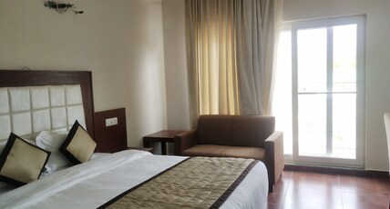 The Grand Kartikeye Hotel Room Type - Super Deluxe AC Room