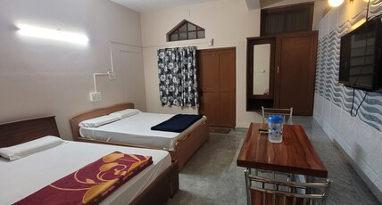 Vasu Inn - Rooms in Valparai Room Type - Standard Double [Basement]