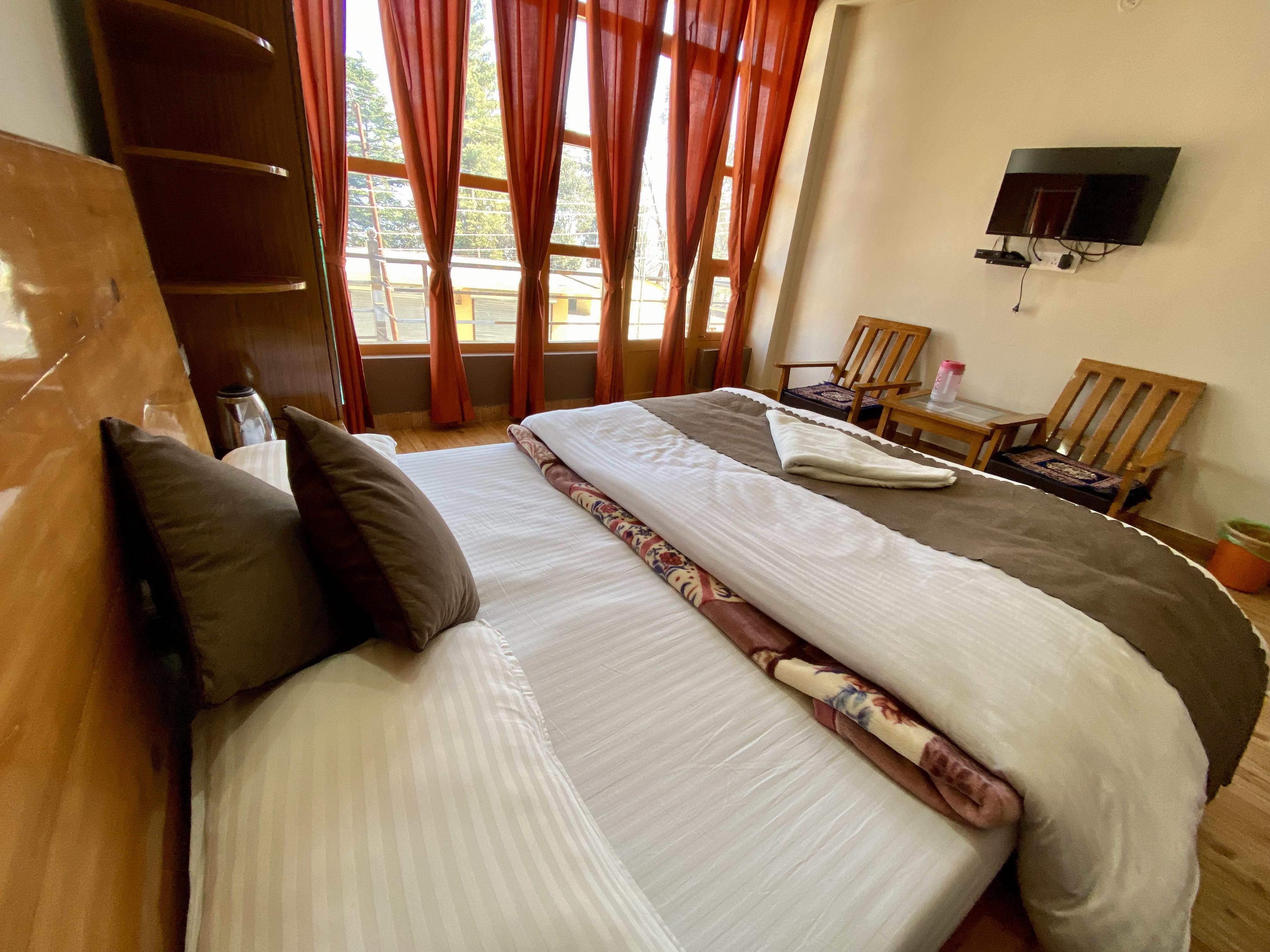 Hotel Mansarovar Inn - Tap to explore photos