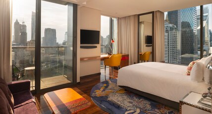Hotel Indigo Bangkok Wireless Road Room Type - 1 King Standard Sunset Garden View Corner Balcony Hotel Indigo Bangkok Wireless Road Room Type - 1 King Standard Sunset Garden View Corner Balcony