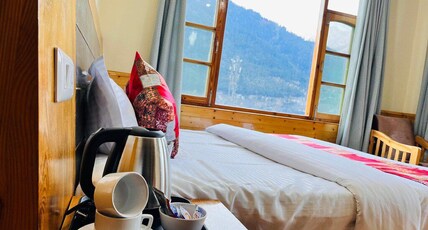 Rohtang Chalet Manali Room Type - Deluxe Room