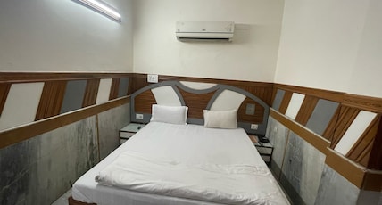 Ajay Guest House Room Type - Triple Bed Room ( 1 Double Bed + 1 Single Bed ) Ajay Guest House Room Type - Triple Bed Room ( 1 Double Bed + 1 Single Bed )