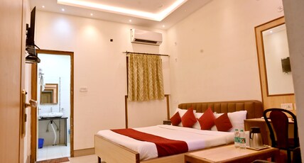 Hotel Kashi (Pure Veg) Room Type - AC Deluxe Room