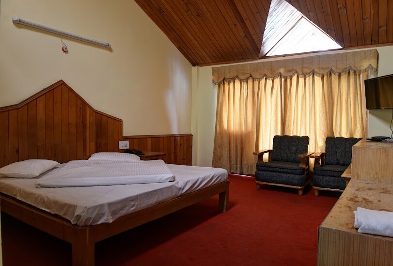 Dharma Galaxy Guest House - Tap to explore photos