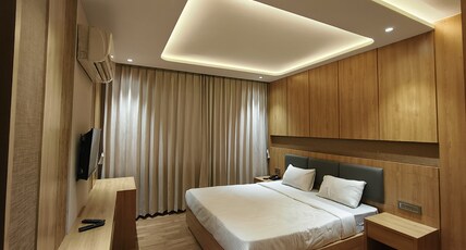 Hotel Sanket Inn Room Type - Premium Deluxe Room