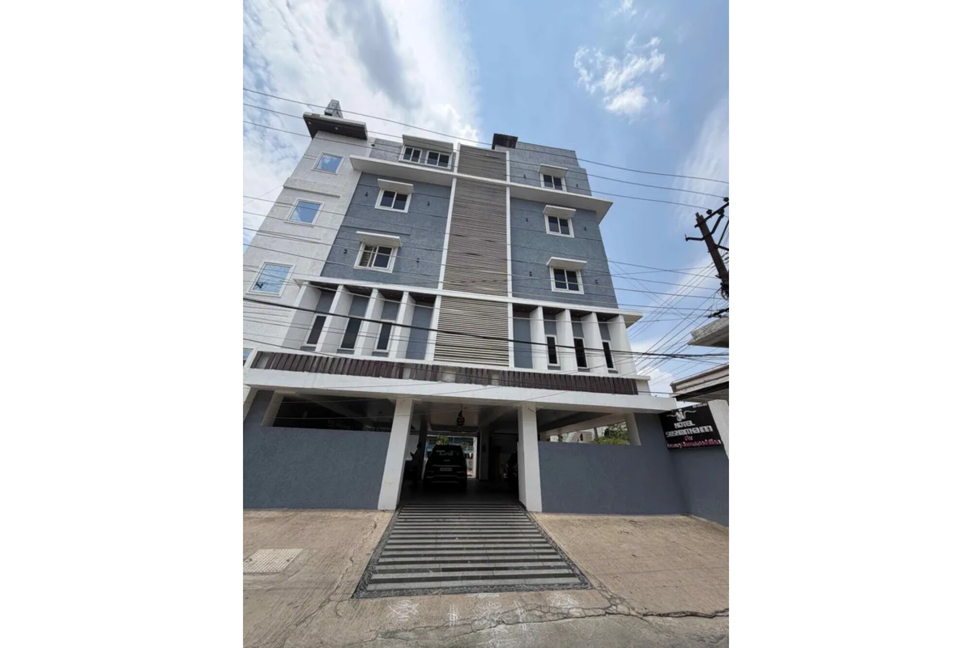 FabHotel Sushmitha Inn - Tap to explore photos