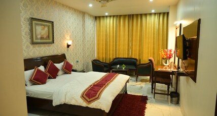 LEGACY SUITS AND RESORT Room Type - Super Deluxe Room