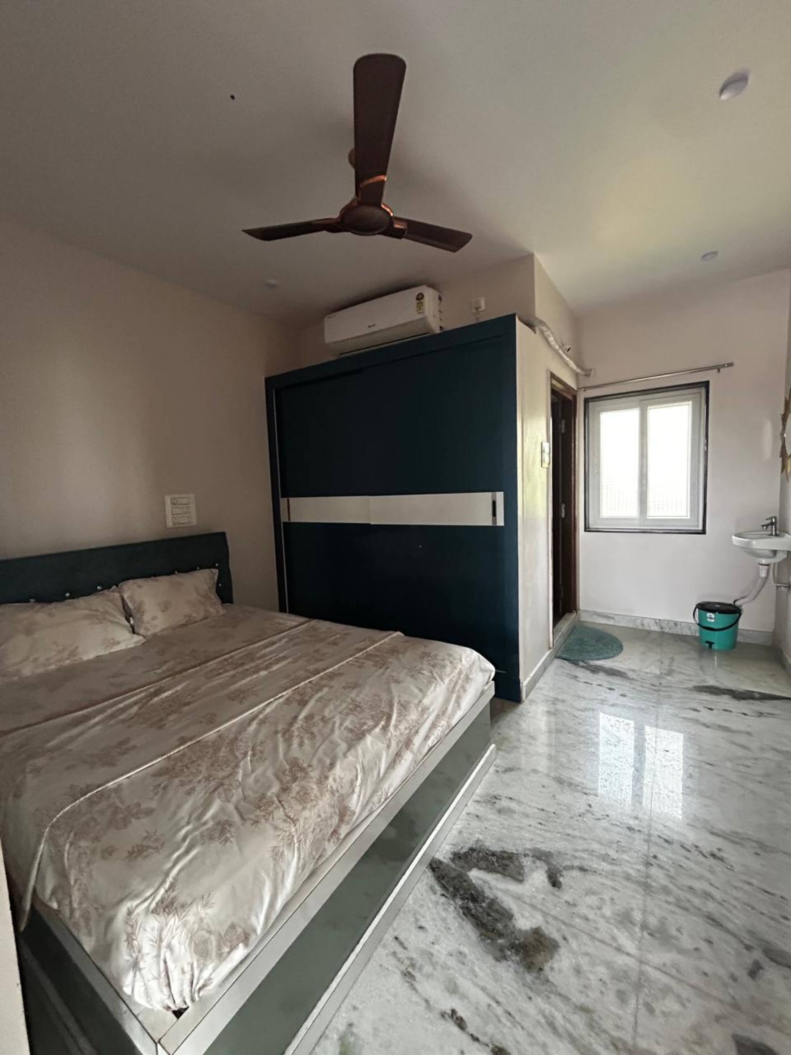 Rithvika Servied Apartment - Tap to explore photos