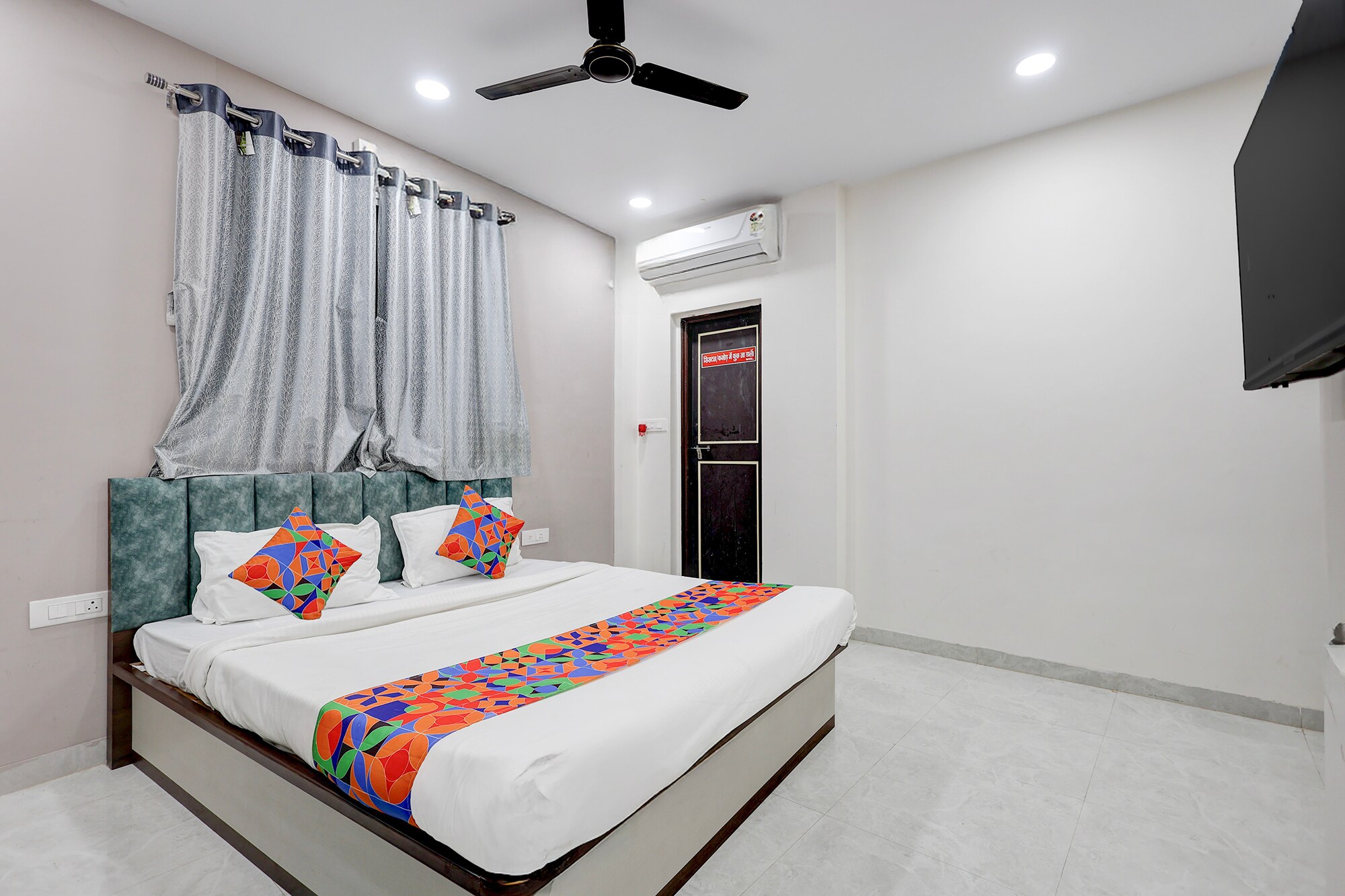 FabHotel Welcome Inn Besa - Tap to explore photos