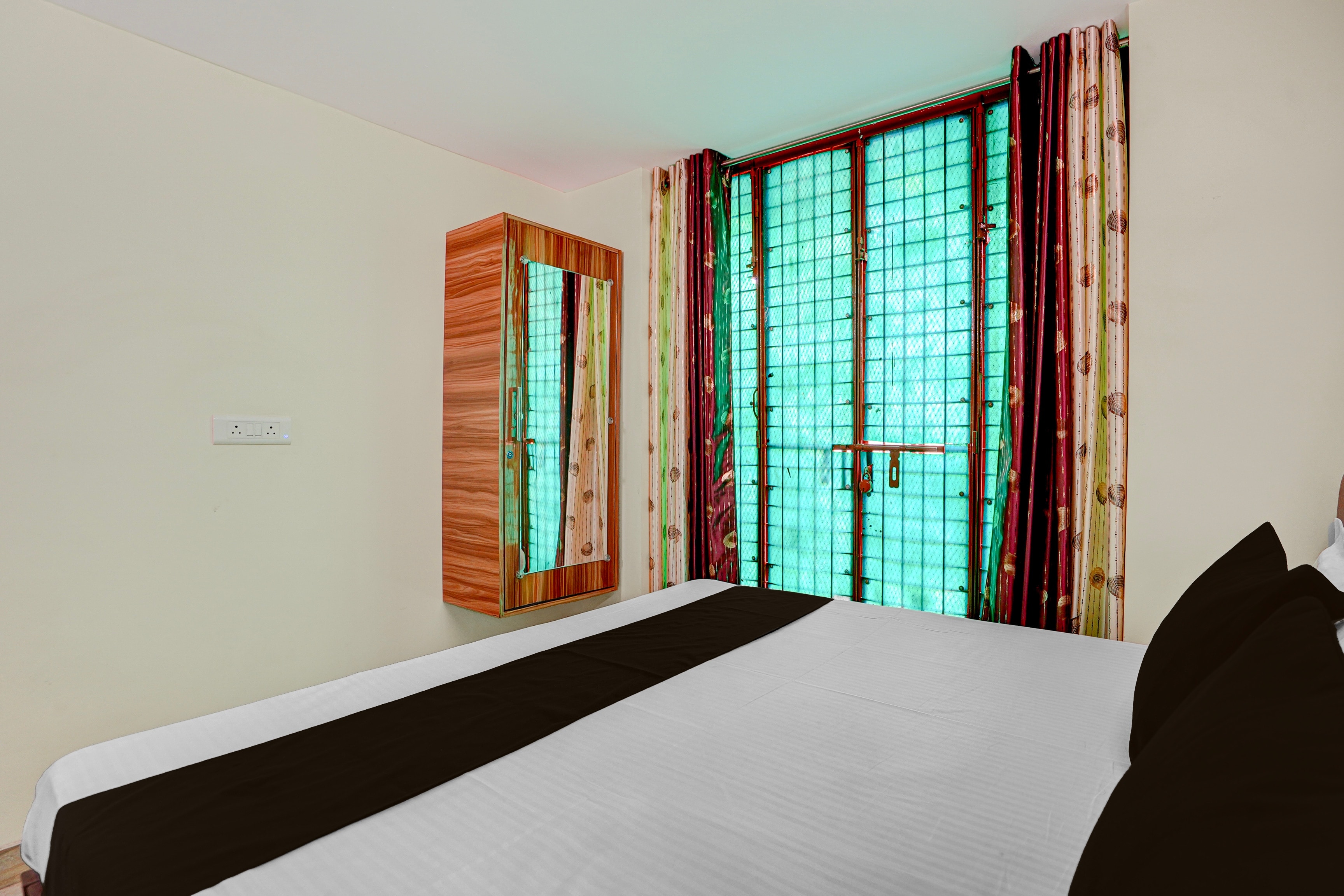 SPOT ON Krishna Home Stay - Tap to explore photos