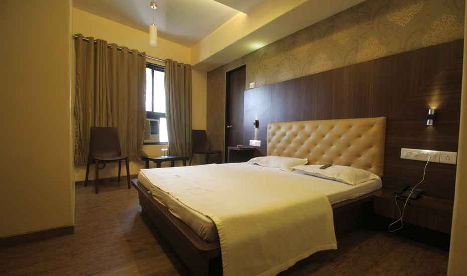 Hotel Karam - Tap to explore photos