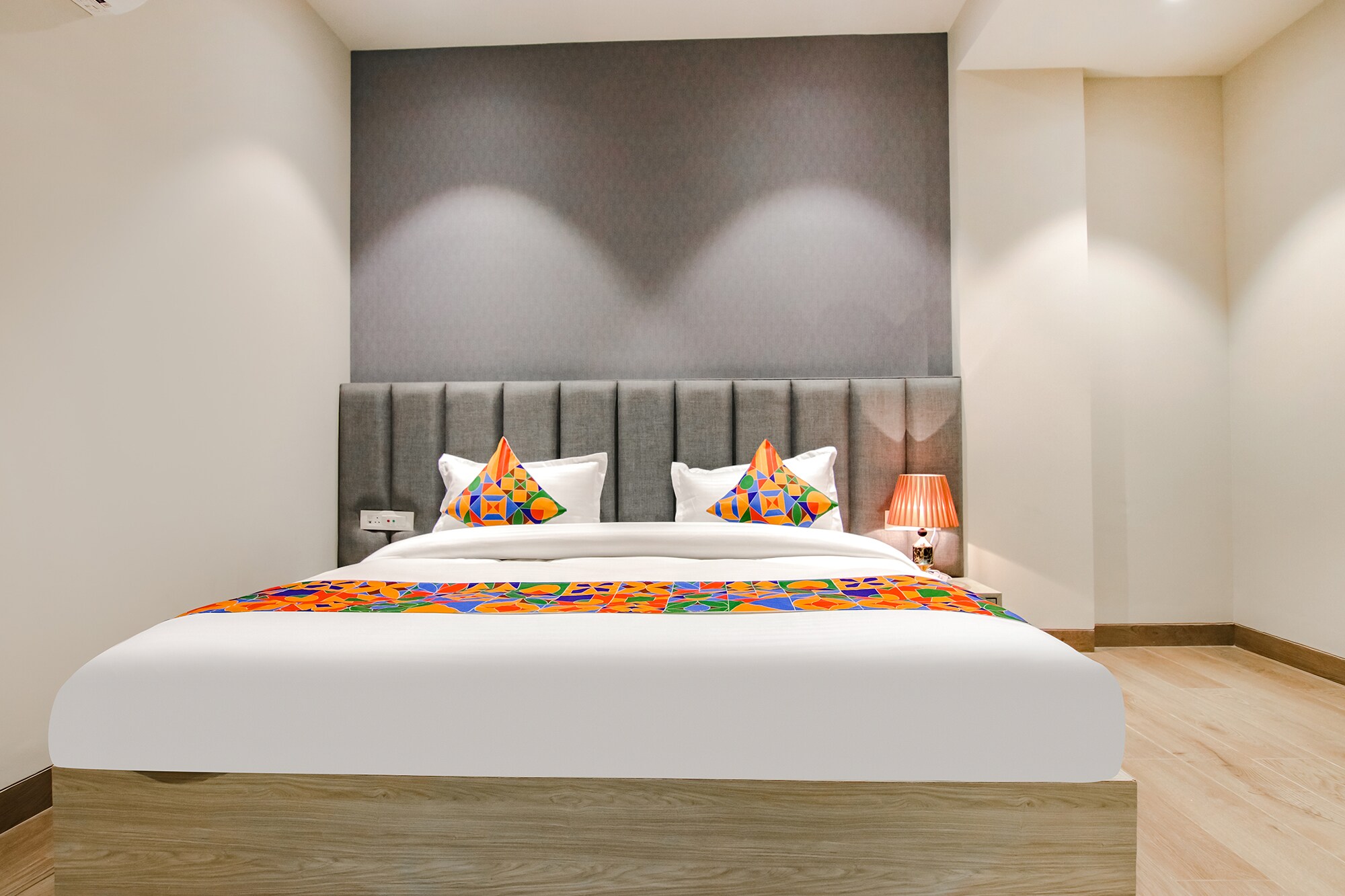 FabHotel Prime K9 Grand - Tap to explore photos