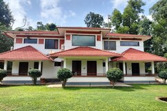 Tropical blooms Homestay Coorg