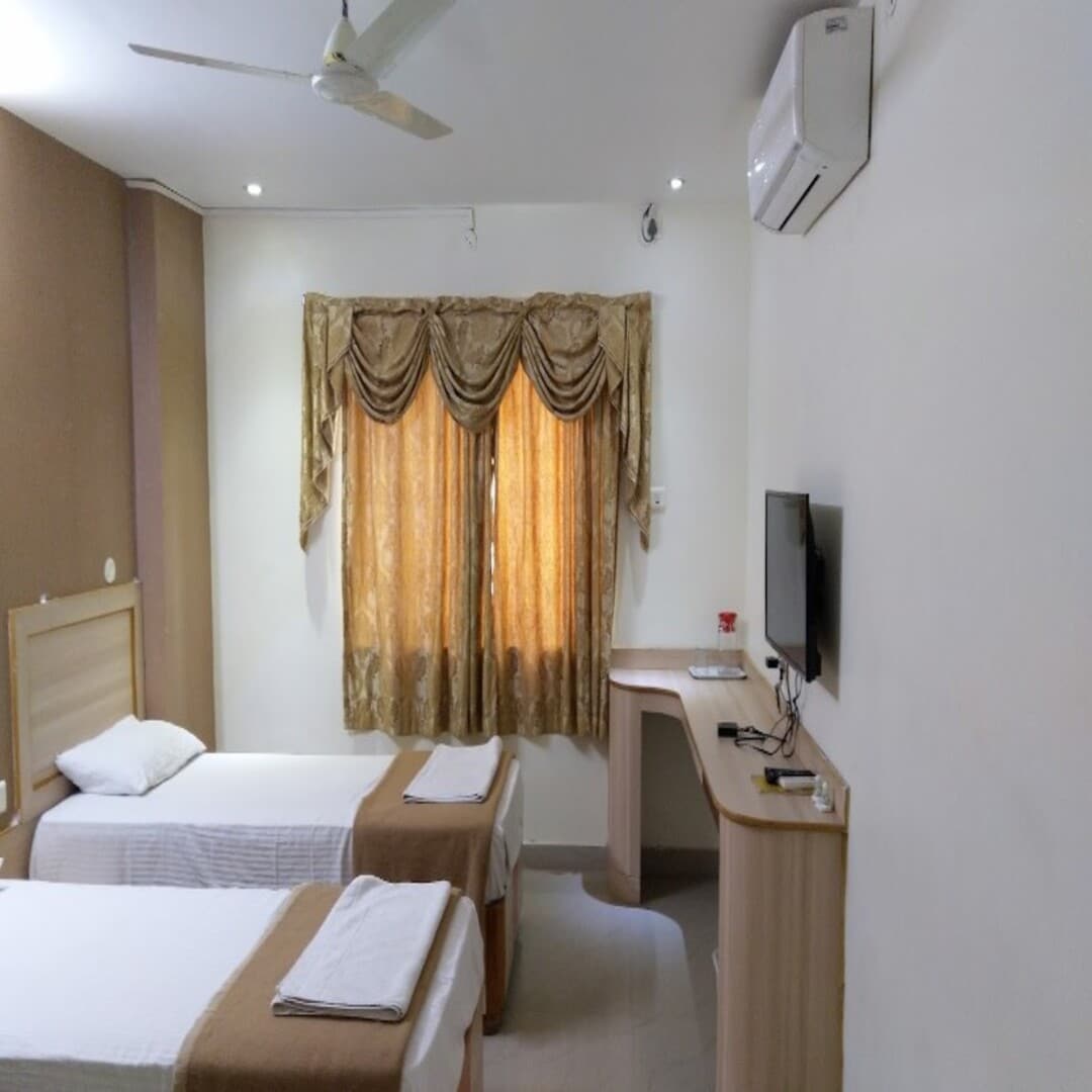Manasa Inn - Tap to explore photos