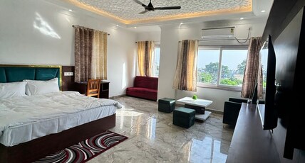Hotel white inn Room Type - Luxury room