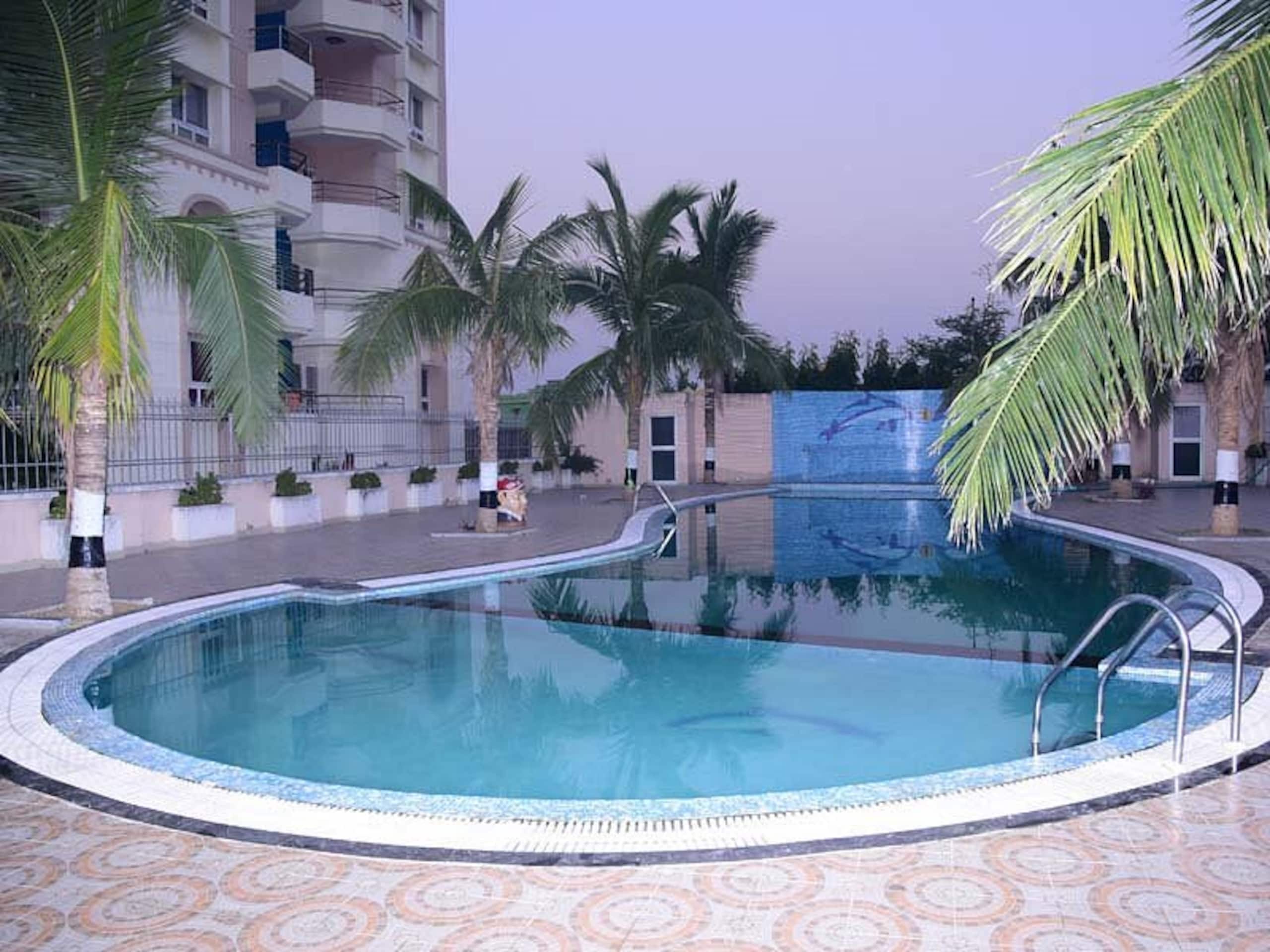 Stylish 1BHK Pool Balcony Kitchen Puri - Tap to explore photos