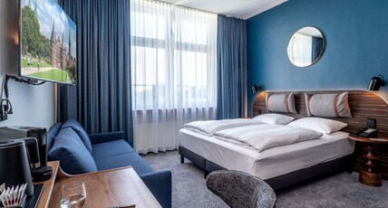 Mercure Hotel Luebeck City Center Room Type - Superior Zimmer mit 1 Queensize Bett (180x200 cm) Mercure Hotel Luebeck City Center Room Type - Superior Zimmer mit 1 Queensize Bett (180x200 cm)