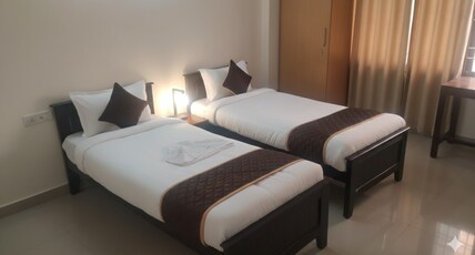 Starlight Hotels OMR Thoraipakkam Room Type - Deluxe Room
