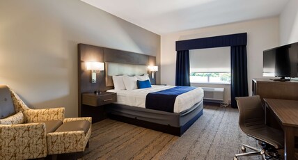 Best Western Plus Roland Inn & Suites Room Type - 1 King Bed, Non-Smoking, Pillowtop Bed, Microwave And Refrigerator, Shower Only, Full Breakfast
