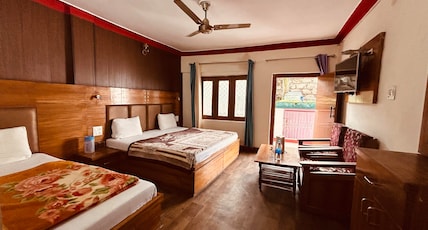 Hotel Brahma Kamal (Near Joshimath Taxi Stand) Room Type - Deluxe Three Bed Hotel Brahma Kamal (Near Joshimath Taxi Stand) Room Type - Deluxe Three Bed