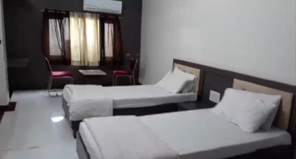 RAVITEJA HOTEL Room Type - AC STANDARD ROOM