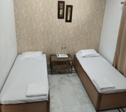 Executive Inn Guest House, Dalmia - Tap to explore photos