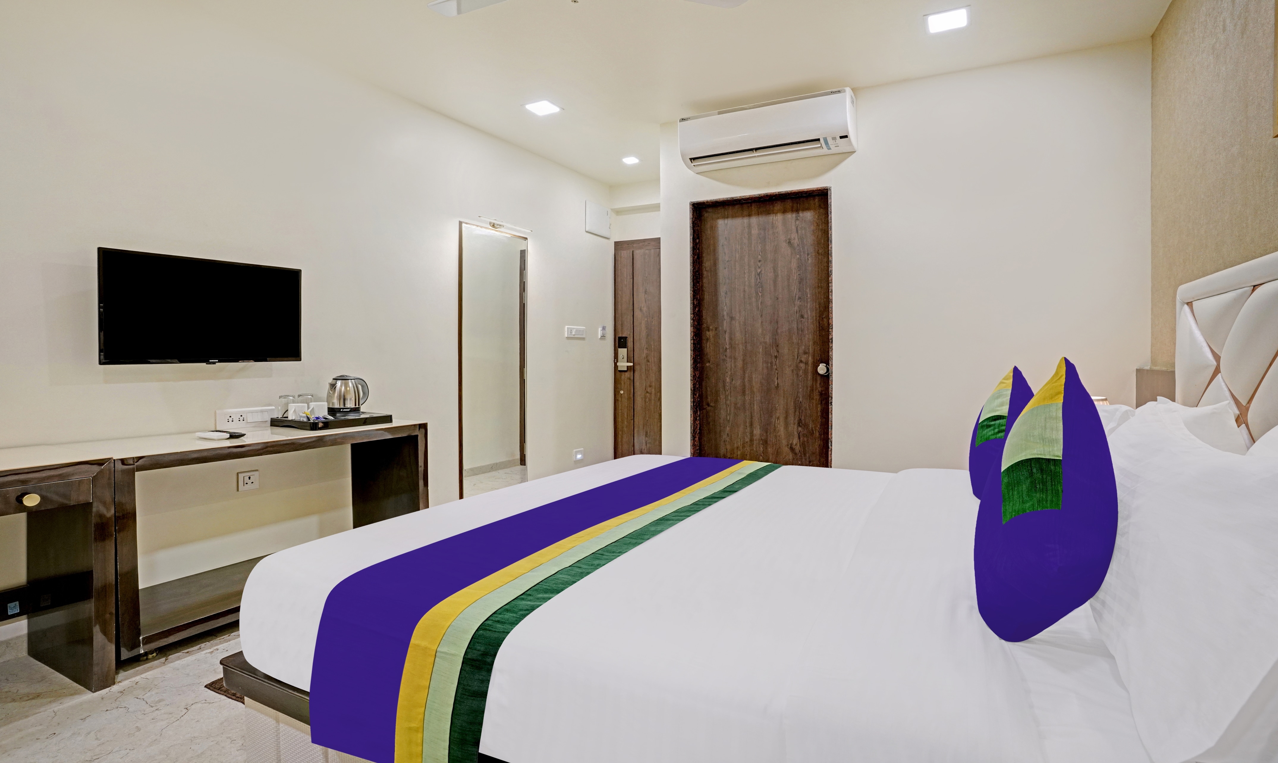 Treebo Premium Golden Bliss Trimurti Nagar Square - Tap to explore photos