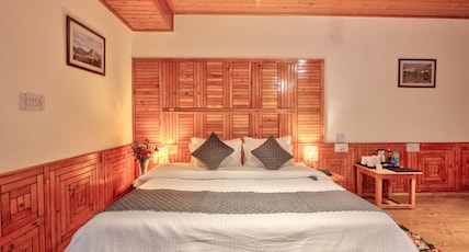 Vyas Vatika - Wooden exotic Resort (Jogni Waterfall & Rohtang pass Views) Room Type - Deluxe Room (Ground Floor, Without Balcony, Jogni Waterfall and valley View) Vyas Vatika - Wooden exotic Resort (Jogni Waterfall & Rohtang pass Views) Room Type - Deluxe Room (Ground Floor, Without Balcony, Jogni Waterfall and valley View)