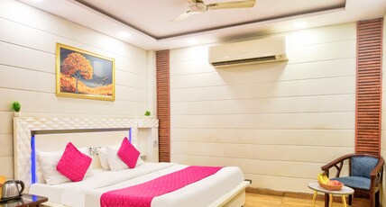 Hotel Flyover Inn Pitampura. Room Type - Deluxe Room King Bed