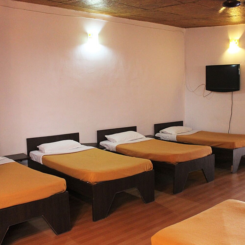 Whispering Woods Amba - Tap to explore photos